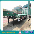 2 axle lowbed trailer with ladder carrying heavy equipment